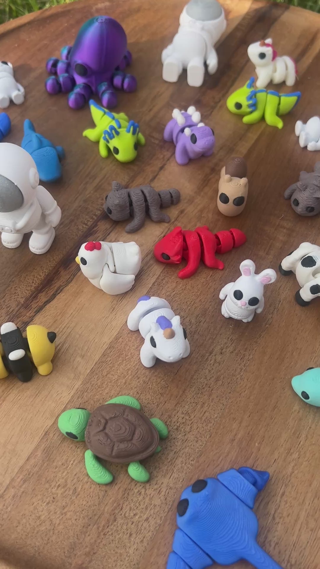Short video displaying a colorful collection of 3D Printed Mini Critters from PLAground Shop.
