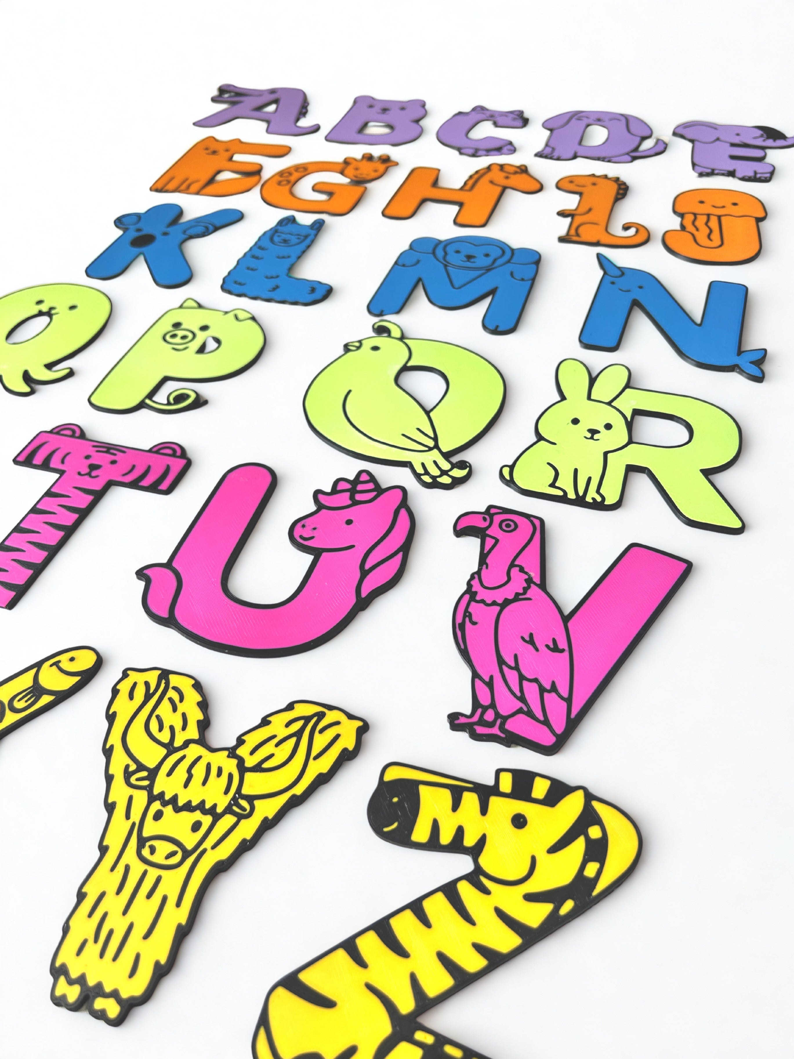 3D printed colorful animal alphabet letters A to Z on a white background